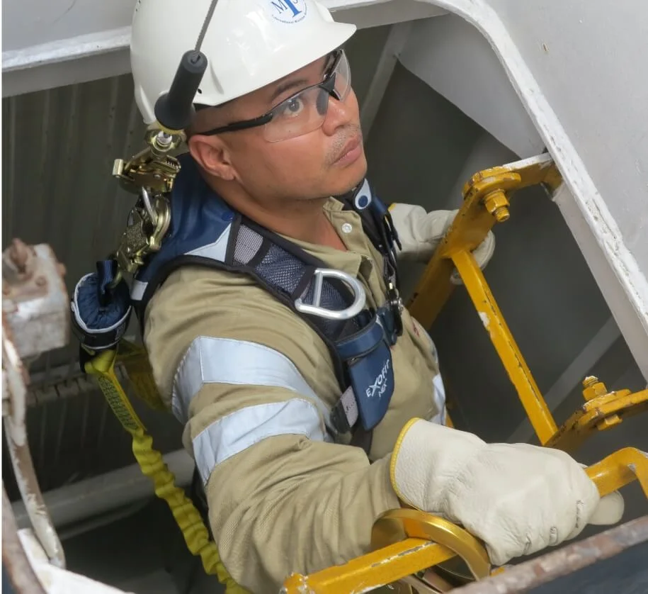 a DP trainee climbing stairs and checking the ship
